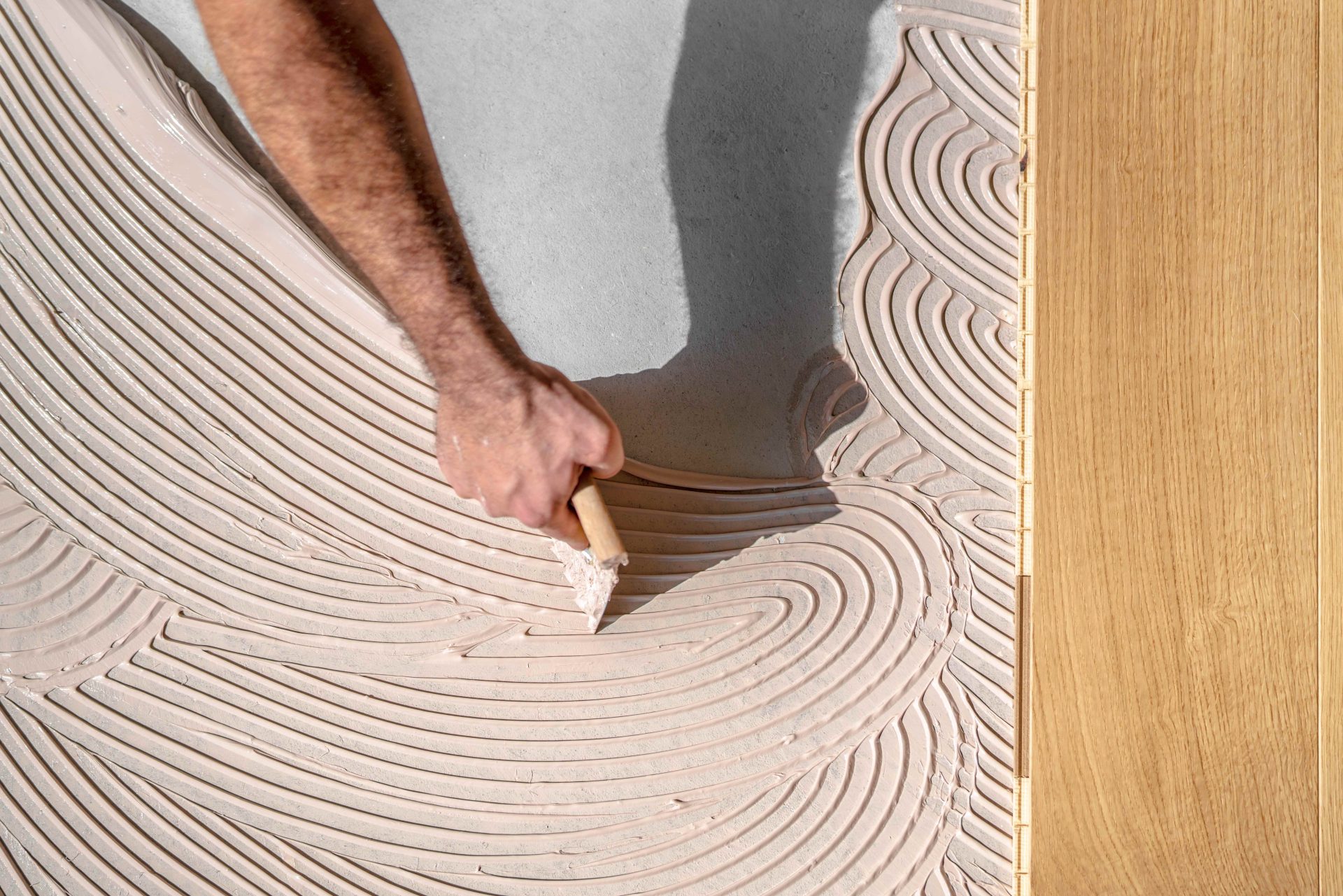 La pose de parquet collé